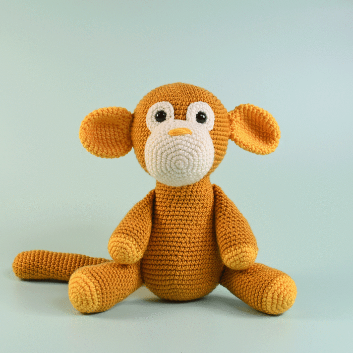 Golden Monkey Crochet Pattern in WoolBox Imagine Classic DK KIt - By Heather Gibbs